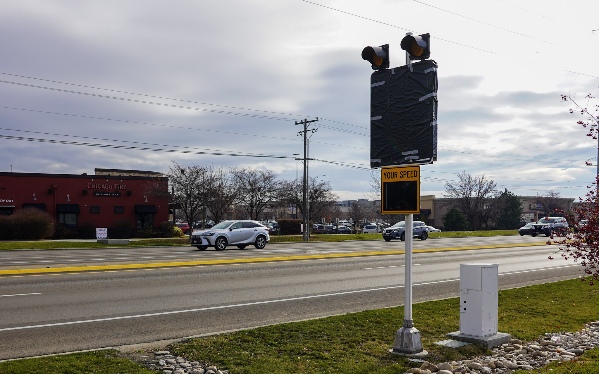 Variable Speed Limit sign on Eagle Road with a plastic bag covering it as it waits to be made operational