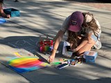 Artist drawing with Chalk