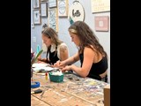 Two girls painting