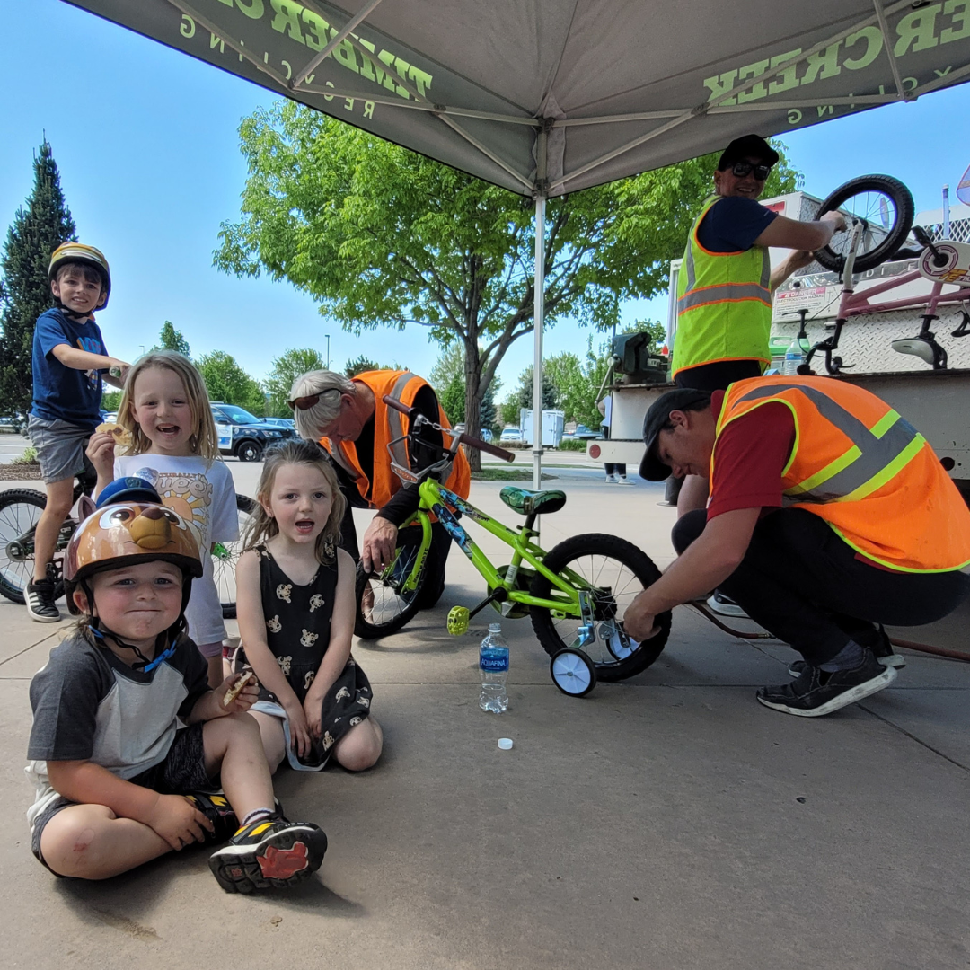 Kids at a bike repair station