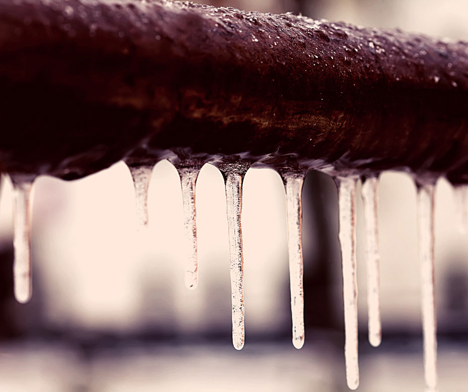 Icicles on a frozen pipe